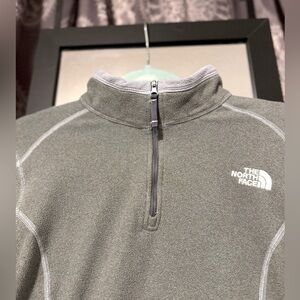 The Northface Fleece Grey medium half-zip Jacket.